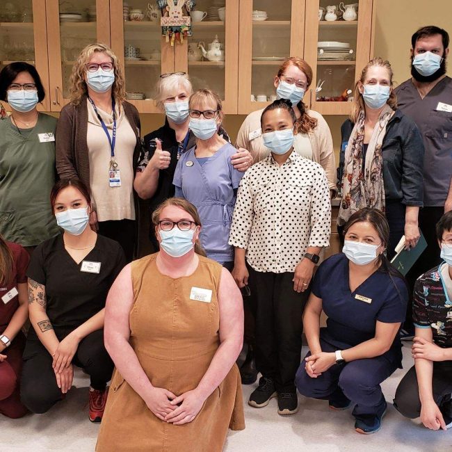 Staff from GRH's Arbutus View unit smile behind their masks following successful EHR activation.